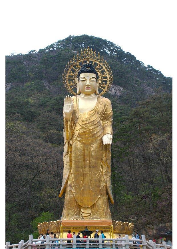 Foto goldene maitreya statue